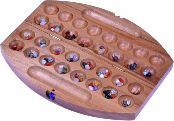 LOGOPLAY Bao - Hus - Kalaha - pequeño Juego de Viaje para Llevar - 30cm de Largo - Juego de Piedras - Juego de Piedras Preciosas - Oval de Madera de Samena Marrón - Image 4