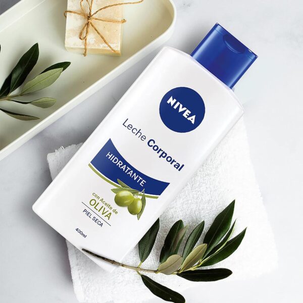 NIVEA Leche Corporal Aceite de Oliva en pack de 6 (6 x 400 ml), leche hidratante corporal con ingredientes naturales, crema para el cuidado de la piel seca - Image 3